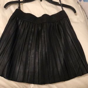 Pleated leather mini skirt
